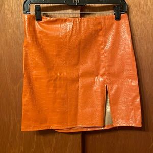 Orange snakeskin skirt